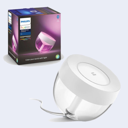 philips hue iris lamp met verpakking op de achtergrond